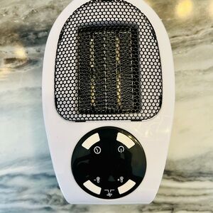 Compact White and Black Electric Heater